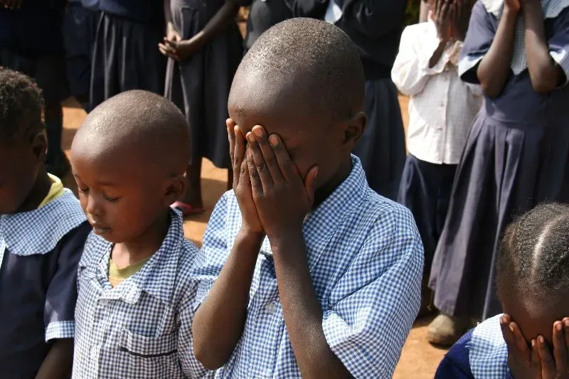 Praying children in Kenya.